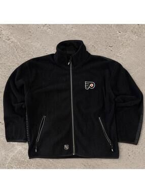 Beautiful vintage 1990s CCM embroidered flyers fleece jacket.